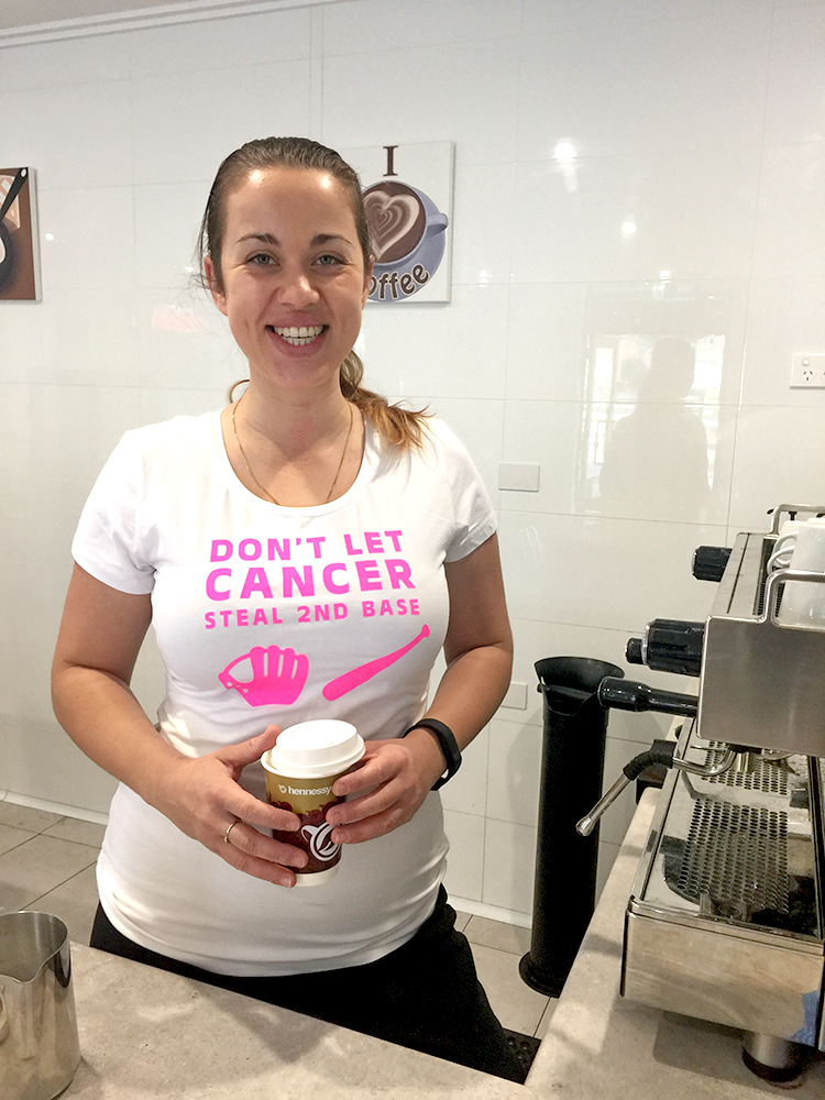 2.	Barista Hayley sporting her Breast Cancer Awareness shirt.