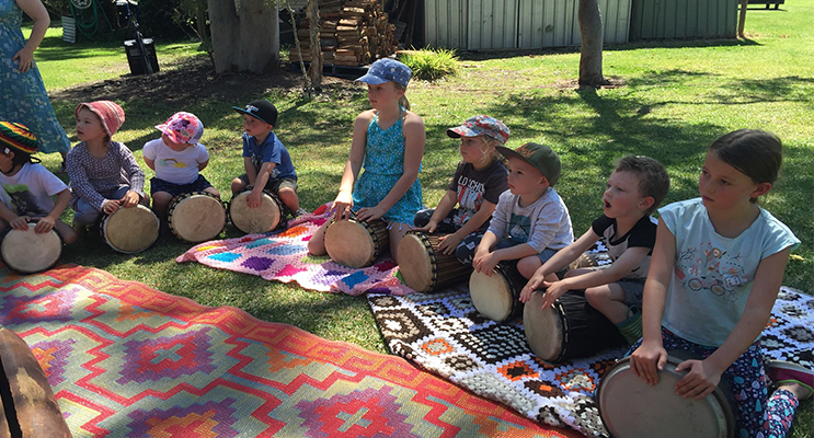 Children at the festival participating in a bongo workshop. Photo: Kim Oakhill 