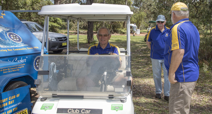 Don Whatham in the cart, Secretary of the Rotary Club.
