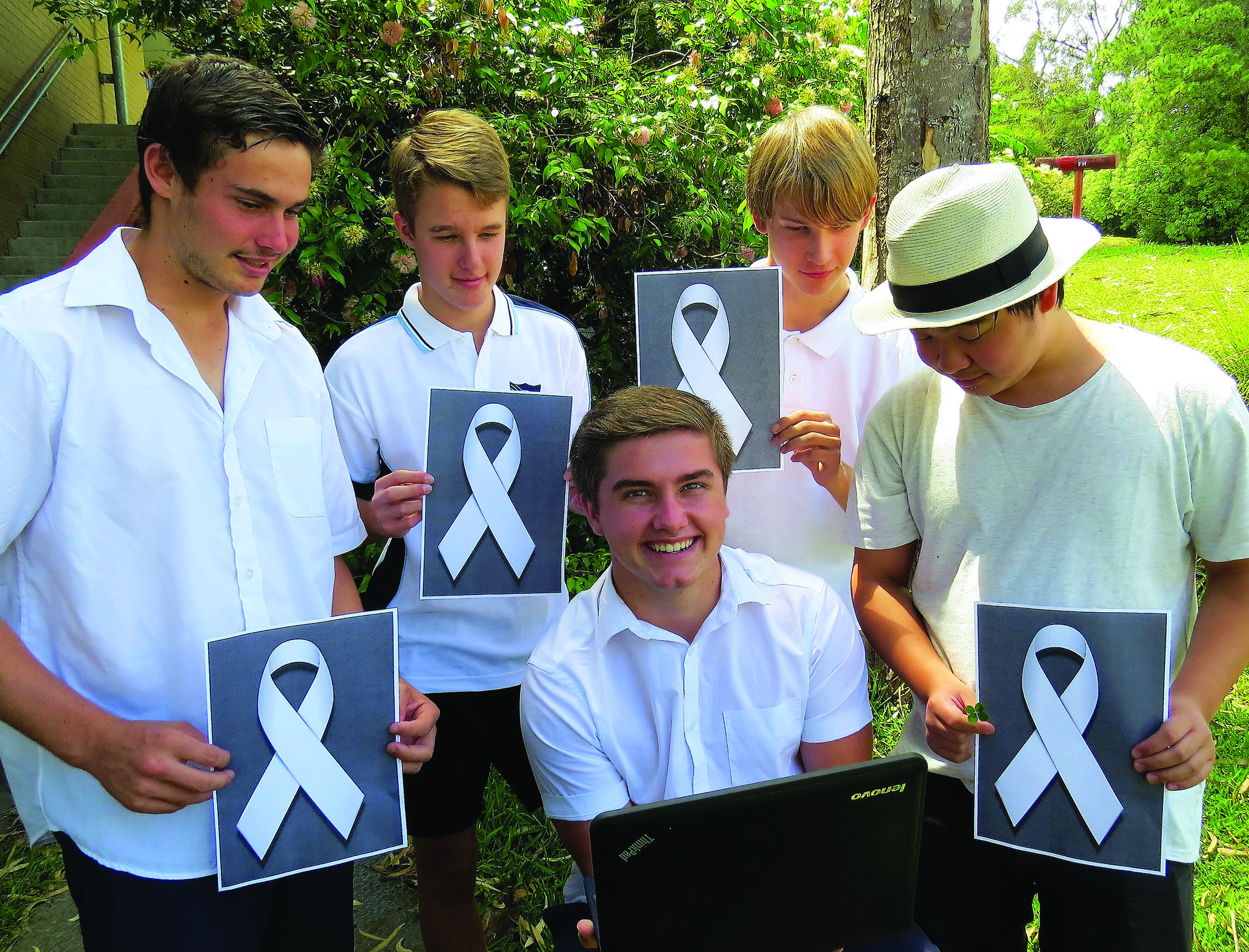 WHITE RIBBON: Matthew Barry, Luke Rochester, Darcy Harris and Timothy To with Bailey Shultz taking the online oath.