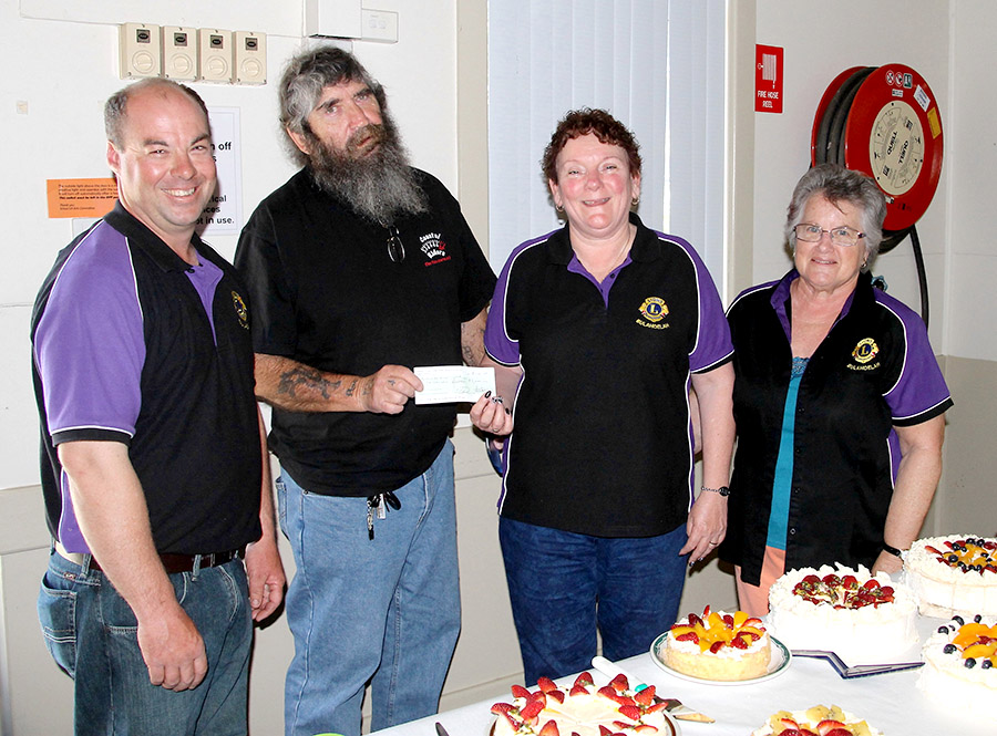 FUNDRAISER: Lion Ian Mason, Bulahdelah Hunting and Social Club Treasurer Greg Russell presenting a cheque to Lion Judy Dixon with Lion Anne Chisholm.   