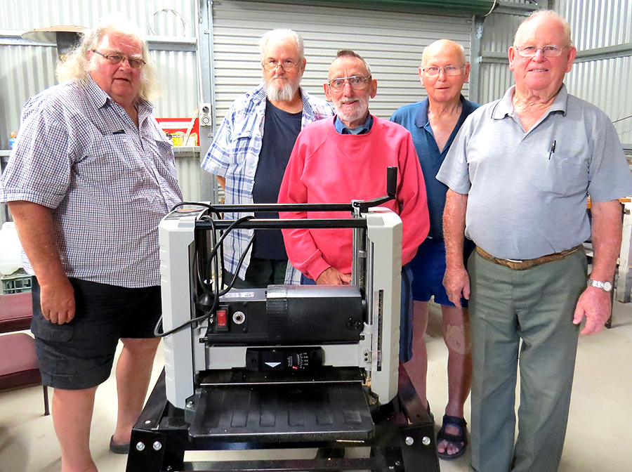 : MEN’S SHED: Neville Wing, Rick, Linnegar, Alan Simonds, Max Burrows and John Renfrew with the new Thicknesser. 