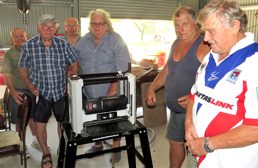 MEN’S SHED: Peter Millen, Jim Brown, Max Burrows, Neville Wing, Garry Haynes and Rodney Costall test the new Thicknesser.
