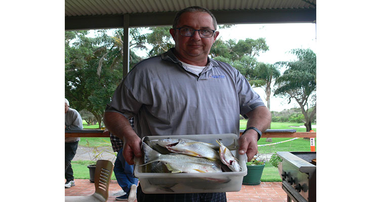 Trevor Peirson displaying some great bream he caught.