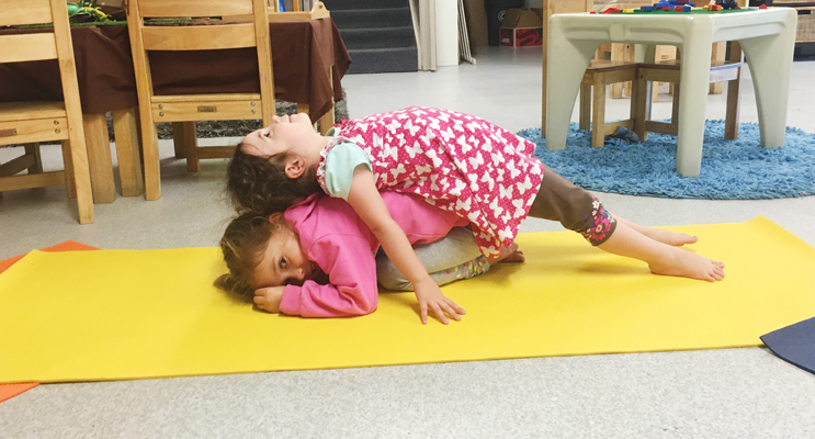 Ella and Kaylee showing their yoga skills.