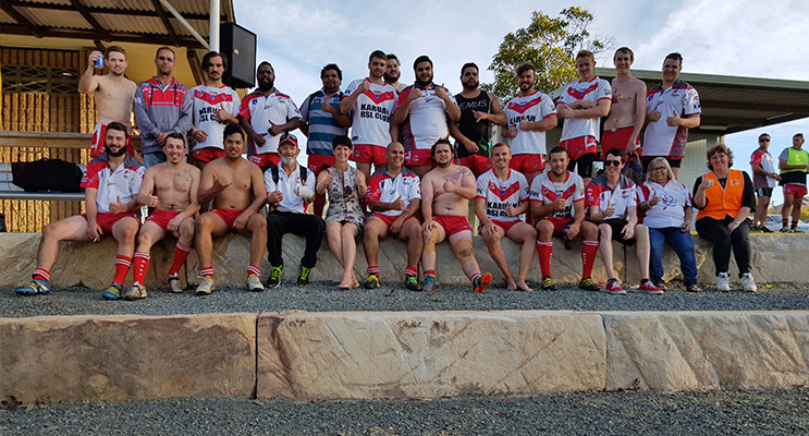 KARUAH SPORTS OVAL: Kate Washington MP front and centre with the Karuah Roos Rugby League Team.