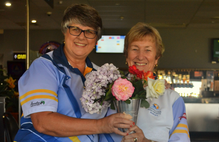 Club Secretary Karen McPhie and Club President Robyn Webster holding "The Trophy".