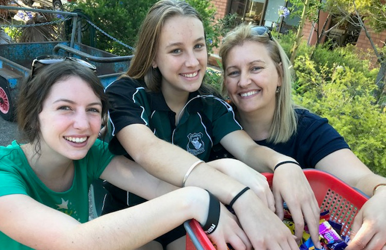 Volunteer Amy Weston with Renee and Chloe Allison