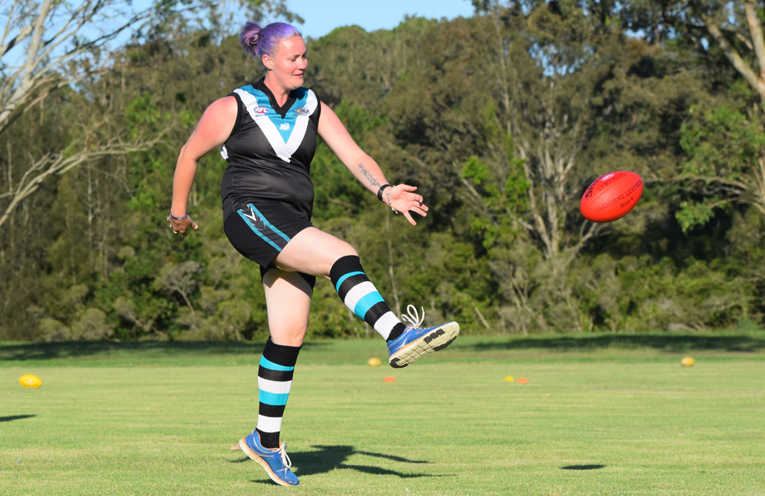 Mel Nelson taking a kick.