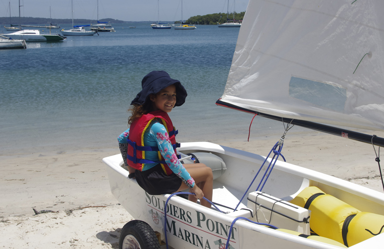 Emily Brill at her first sailing lesson with the Soldiers Point Marina Sailing School. Photo by Marian Sampson.