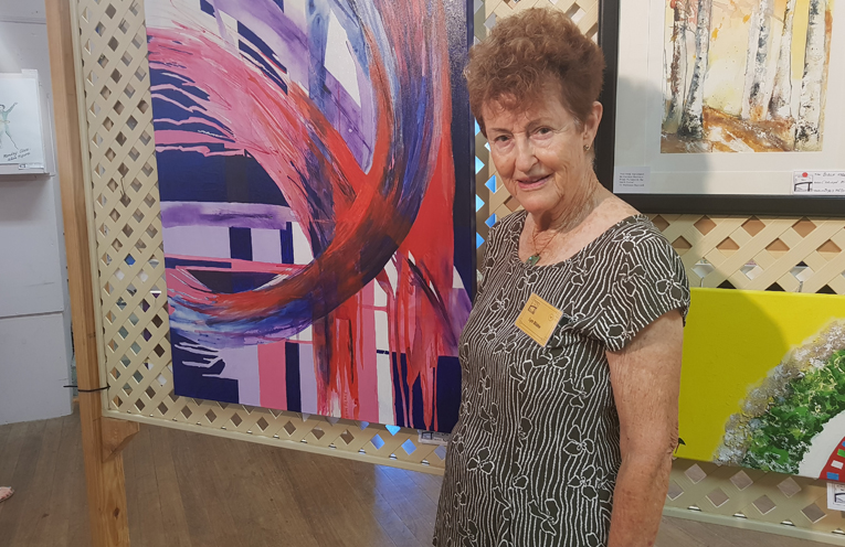 U3A ART CO-ORDINATOR: Lyn Blake with one off her works.